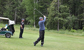 Jason Surprovich takes a shot at the pin during a playoff for first place.    Tim Brody / Bulletin Photo