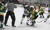 Sioux Lookout Bombers forward Ty Kirk (left) and Thunder Bay North Stars forward Beau Helmeczi (right) battle for the puck in the Bombers’ home and season opener on Sept. 13. The SIJHL reigning champion Bombers went on to blank the North Stars 4-0 in the 