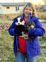 Dr Patty Lecten with two puppies at the Spay/Neuter & Vaccine Clinic in Eabametoong First Nation.     Photo courtesy of Matawa First Nations