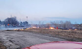 Members of the Sioux Lookout Fire Department conduct a controlled burn at the west end of Front Street.    Photo courtesy of the Sioux Lookout Fire Department