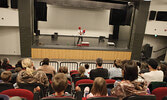 Tim Holland, along with his puppets Crackers the parrot and Julius  the turtle, delighted audience members, some of whom assisted him with his performance.    Tim Brody / Bulletin Photo