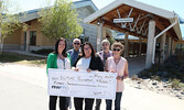 The Sioux Lookout Meno Ya Win Health Centre Foundation receives a donation from the Nuclear Waste Management Organization in the amount of $15,000 to help purchase an MRI unit for the hospital. From left: SLMHC Foundation Donor Relations/Operations Coordi