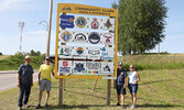 From left: Rotary Club of Sioux Lookout members Bill Hochstedler, Lorenzo Durante, Andreas Kottschoth (Club President), and Alanna Pizziol-Carroll pose for a photo after Rotary Club members finished erected the new sign promoting local clubs and organizat