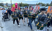 Community members marched through the downtown core last Thursday evening in support of everyone’s right to be safe and live free from violence in Sioux Lookout.      Tim Brody / Bulletin Photo 