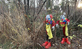 Ghastly sights met those brave enough to traverse the haunted trail during Boo at the Bay. Haunters posed for a group photo at the event’s conclusion.     Tim Brody / Bulletin Photo