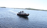 Brothers Todd MacDonald (left) and Jason MacDonald make their way to the dock near the end of Day 2.     Tim Brody / Bulletin Photo 